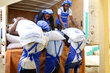 WFP-Lagerarbeiter entladen Hilfsgüter in Haiti