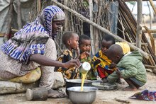 Photo: WFP/Michael Tewelde Children having super plus porridge following the resumption of refugee food assistance in in Bokolmayo refugee camp, Somali region of Ethiopia.